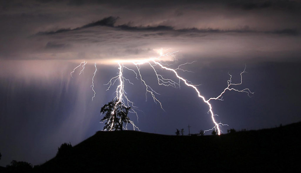 Lightning strikes above the Geysers area of northern Sonoma County, early Thursday, July 4, 2013 near Geyserville Calif. (AP Photo/Santa Rosa Press Democrat, Kent Porter) MANDATORY CREDIT: KENT PORTER/SANTA ROSA PRESS DEMOCRAT
